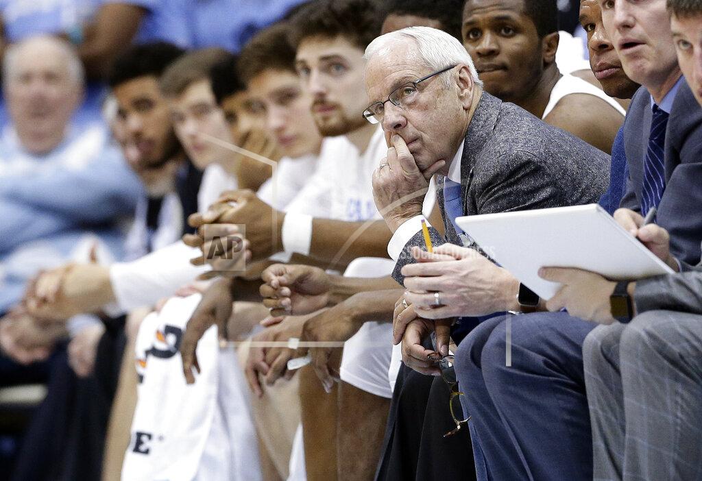 Gerry Broome North Carolina head coach Roy Williams watches from the bench during the second half of an NCAA college basketball game against Louisville in Chapel Hill, N.C., Saturday, Jan. 12, 2019. Louisville won 83-62. (AP Photo/Gerry Broome)