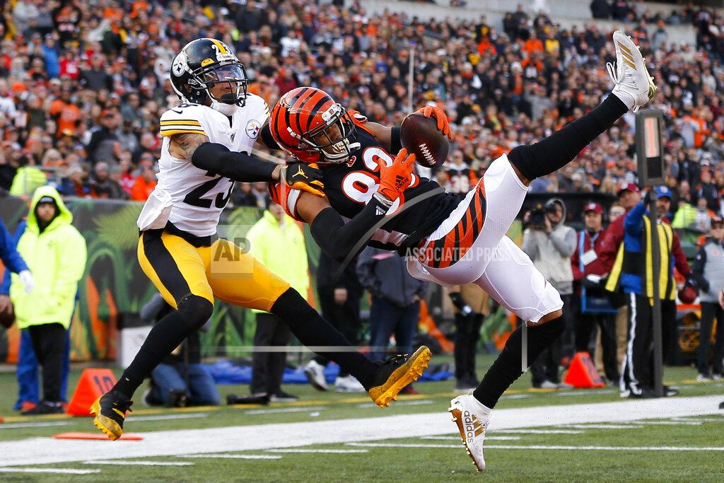 Frank Victores Cincinnati Bengals wide receiver Tyler Boyd (83) catches a touchdown pass against Pittsburgh Steelers cornerback Joe Haden (23) during the first half an NFL football game, Sunday, Nov. 24, 2019, in Cincinnati. (AP Photo/Frank Victores)