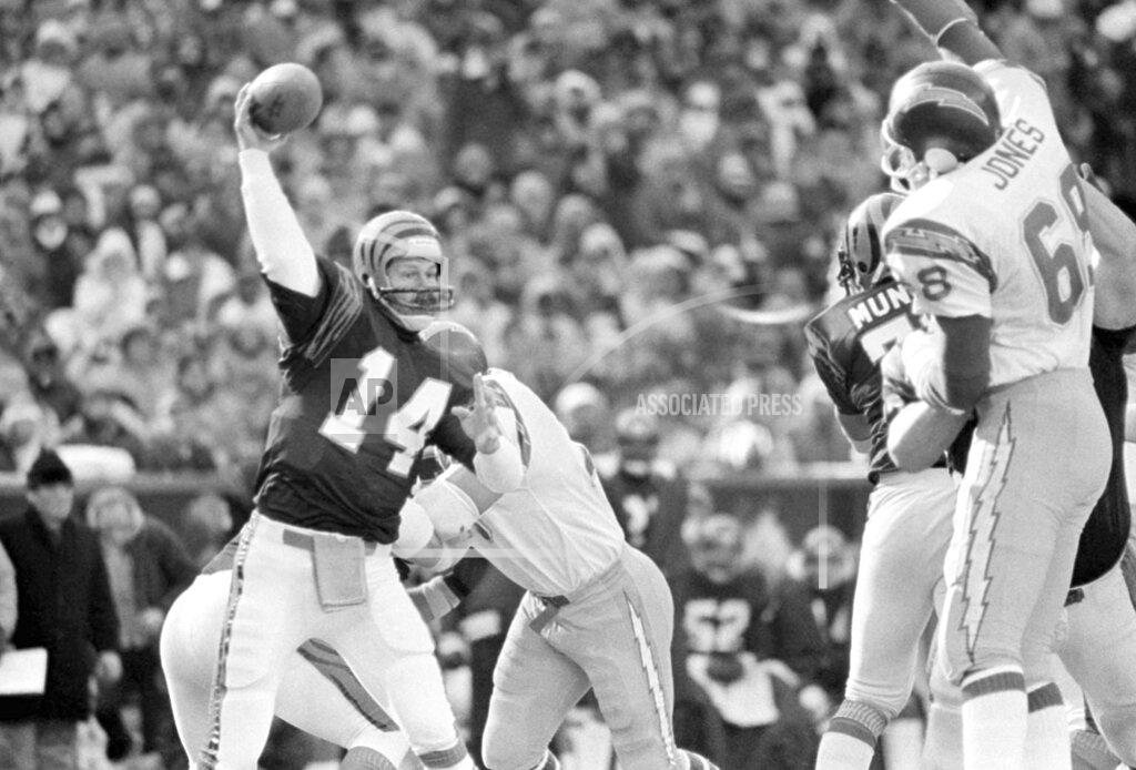 Anonymous FILE - In this Jan. 10, 1982 file photo, Cincinnati Bengals quarterback Ken Anderson, left, prepares to throw during the AFC championship game against the San Diego Chargers in Cincinnati. Cincinnati Bengals coach Forrest Gregg called the Freezer Bowl -- a 27-7 win over the San Diego Chargers on Jan. 2, 1982 -- worse than the Ice Bowl on Dec. 31, 1967, when he was an offensive lineman for Vince Lombardi's Packers in the most famous cold-weather game in NFL history. (AP Photo/File)