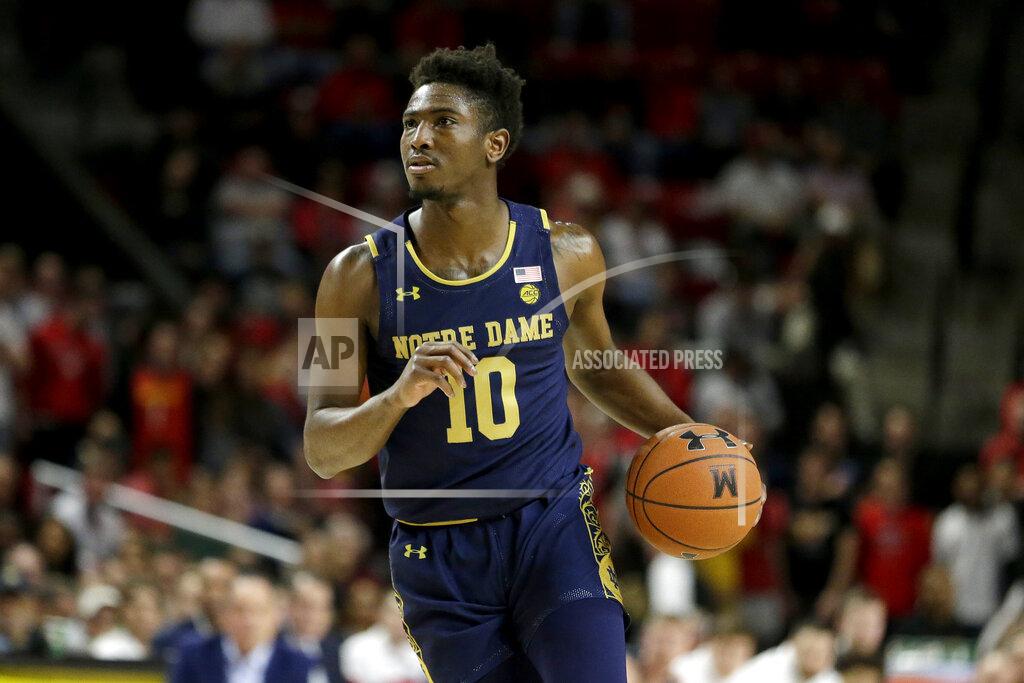 Julio Cortez Notre Dame guard TJ Gibbs drives against against Maryland during the first half of an NCAA college basketball game, Wednesday, Dec. 4, 2019, in College Park, Md. (AP Photo/Julio Cortez)