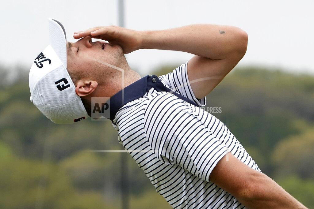 David J. Phillip Justin Thomas reacts after missing his birdie putt on the 14th hole in his match against Matt Kuchar during a first round match at the Dell Technologies Match Play Championship golf tournament Wednesday, March 24, 2021, in Austin, Texas. (AP Photo/David J. Phillip)