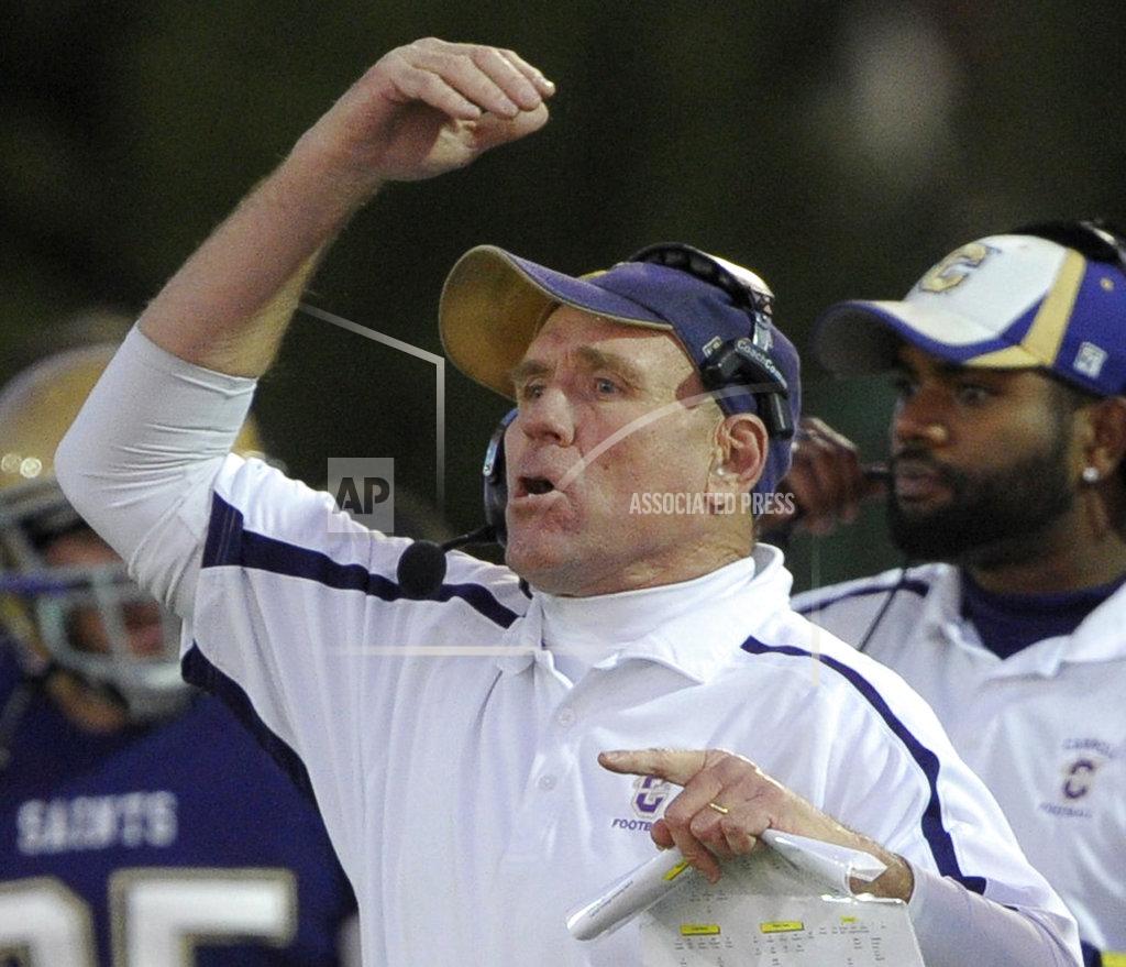 Carroll coach retires after 20 seasons, 6 national titles