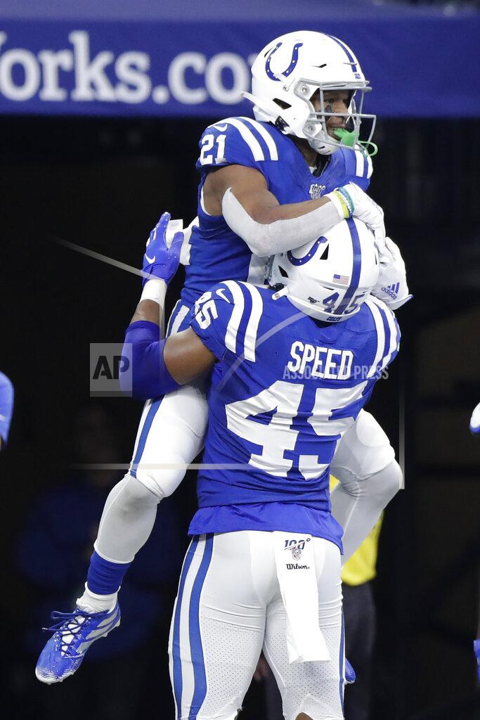 Michael Conroy Indianapolis Colts' Nyheim Hines (21) celebrates with E.J. Speed (45) after running back a punt for a touchdown during the second half of an NFL football game against the Carolina Panthers, Sunday, Dec. 22, 2019, in Indianapolis. (AP Photo/Michael Conroy)