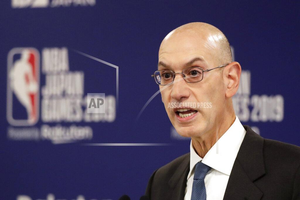 FILE - In this Oct. 8, 2019, file photo, NBA Commissioner Adam Silver speaks at a news conference before an NBA preseason basketball game between the Houston Rockets and the Toronto Raptors in Saitama, Japan. Silver is giving preseason state-of-the-league remarks Monday, Dec. 21, 2020, before opening night Tuesday, talking about how the league will handle the ongoing pandemic and the continued focus on social issues such as racial injustice. (AP Photo/Jae C. Hong, File)