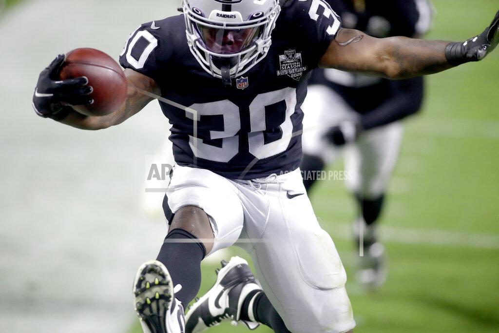 Isaac Brekken Las Vegas Raiders running back Jalen Richard (30) scores a touchdown against the New Orleans Saints during the second half of an NFL football game, Monday, Sept. 21, 2020, in Las Vegas. (AP Photo/Isaac Brekken)