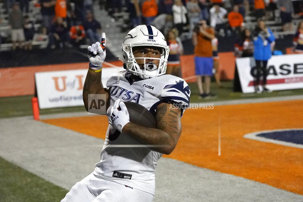 Charles Rex Arbogast UTSA running back Brendon Brady celebrates his touchdown run during the second half of an NCAA college football game against Illinois, Saturday, Sept. 4, 2021, in Champaign, Ill. (AP Photo/Charles Rex Arbogast)