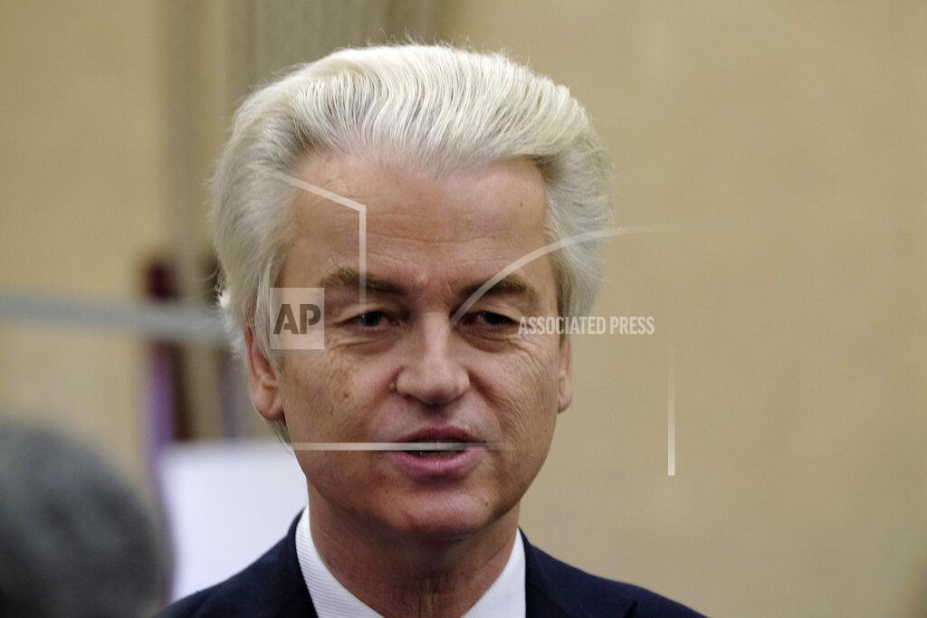 Patrick Post Populist Dutch anti-immigration lawmaker Geert Wilders answers reporters after casting his vote in a general election in The Hague, Wednesday, March 17, 2021. Polling stations have opened opened across the Netherlands from Monday in a general election that has been spread over three days to allow people to vote safely during the coronavirus pandemic. (AP Photo/Patrick Post)