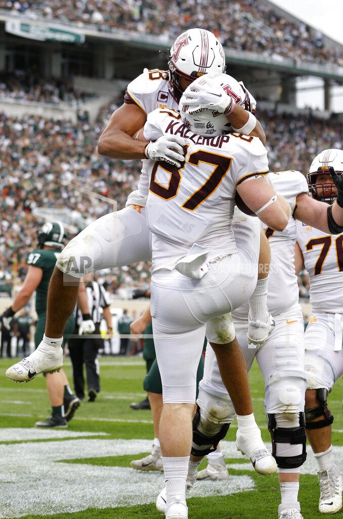 Al Goldis Minnesota's Nick Kallerup (87) celebrates his touchdown against Michigan State with Brevyn Spann-Ford, rear, during the second half of an NCAA college football game, Saturday, Sept. 24, 2022, in East Lansing, Mich. Minnesota won 34-7. (AP Photo/Al Goldis)