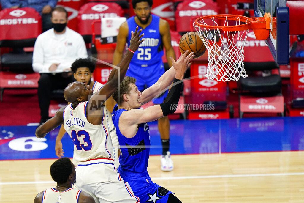 Matt Slocum Orlando Magic's Moritz Wagner, right, goes up for a shot against Philadelphia 76ers' Anthony Tolliver during the second half of an NBA basketball game, Sunday, May 16, 2021, in Philadelphia. (AP Photo/Matt Slocum)