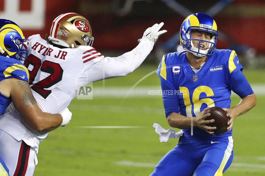 Jed Jacobsohn San Francisco 49ers defensive end Kerry Hyder Jr., left, applies pressure to Los Angeles Rams quarterback Jared Goff (16) during the second half of an NFL football game in Santa Clara, Calif., Sunday, Oct. 18, 2020. (AP Photo/Jed Jacobsohn)