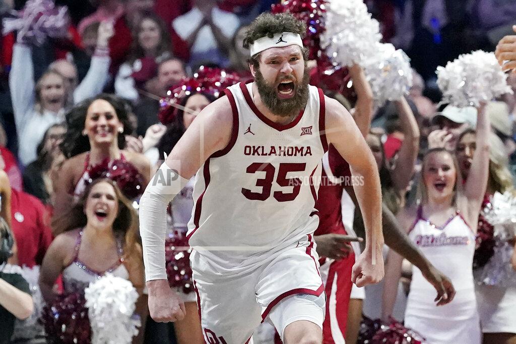 Sue Ogrocki Oklahoma forward Tanner Groves (35) celebrates after a dunk in the second half of an NCAA college basketball game against Arkansas, Saturday, Dec. 11, 2021, in Tulsa, Okla. (AP Photo/Sue Ogrocki)