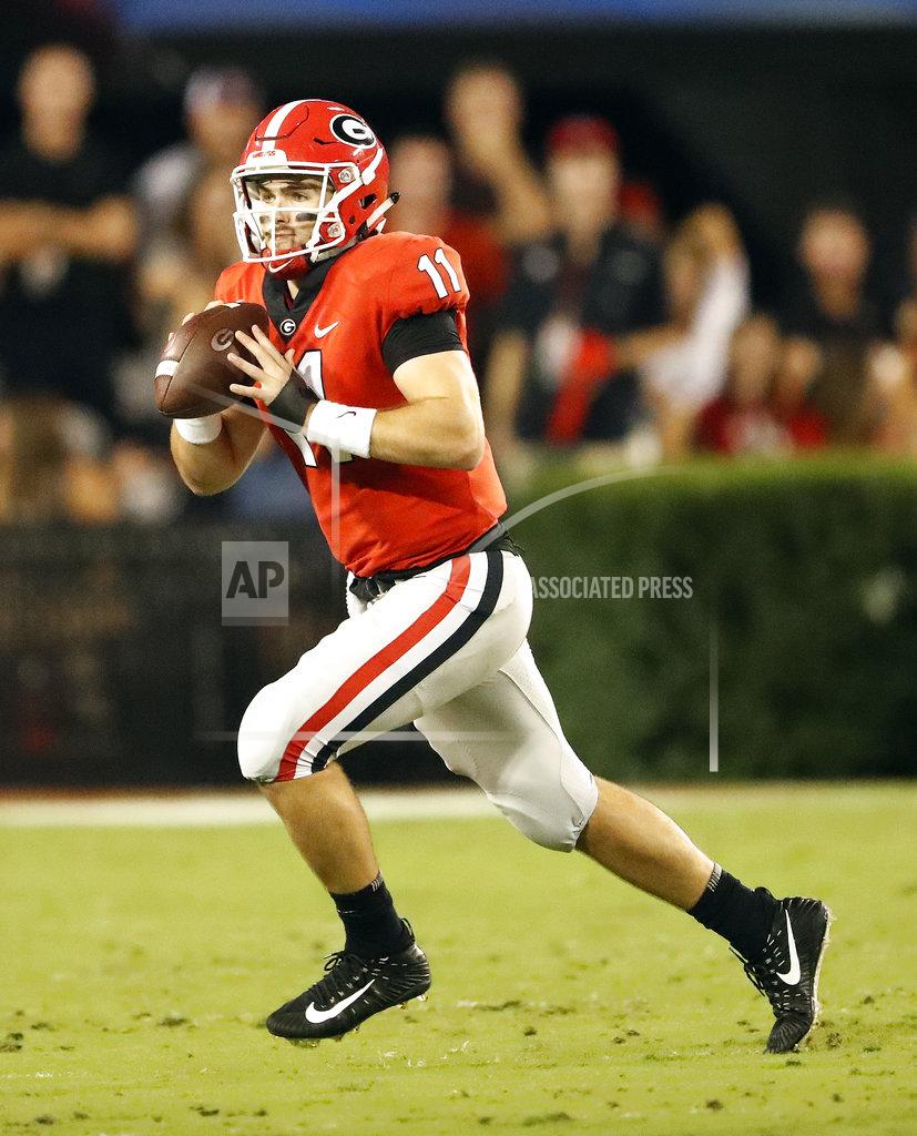 FILE - In this Oct. 6, 2018, file photo, Georgia quarterback Jake Fromm (11) is shown against Vanderbilt during the first half of an NCAA college football game, in Atlanta, Ga. No. 7 Georgia plays at No. 9 Florida on Saturday. (AP Photo/John Bazemore, File)