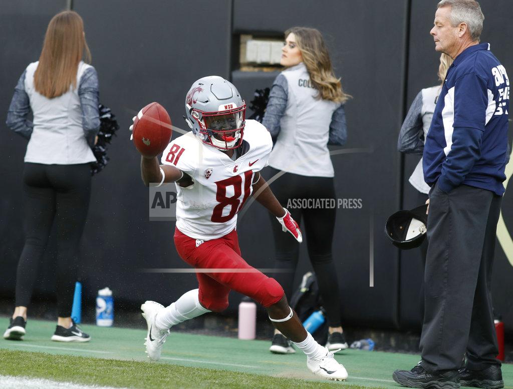 David Zalubowski Washington State wide receiver Renard Bell celebrates his touchdown catch against Colorado in the second half of an NCAA college football game Saturday, Nov. 10, 2018, in Boulder, Colo. Washington State won 31-7. (AP Photo/David Zalubowski)