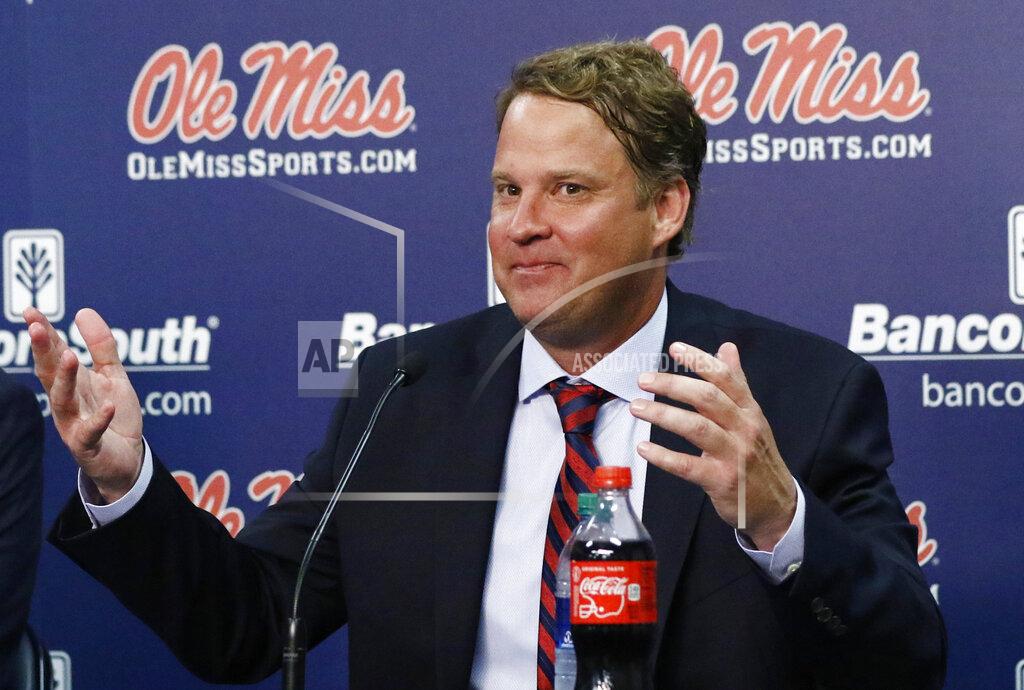 Rogelio V. Solis Lane Kiffin responds to reporters questions at a news conference, after being introduced to Mississippi fans as their new NCAA college football coach, at The Pavilion, a multipurpose arena on the campus in Oxford, Miss., Monday, Dec. 9, 2019. Kiffin was previously, the football coach for three years at Florida Atlantic. (AP Photo/Rogelio V. Solis)