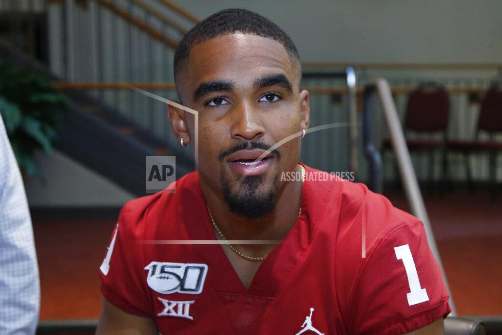 Sue Ogrocki Oklahoma quarterback Jalen Hurts, who transferred in from Alabama in January, answers a question during an NCAA college football media day in Norman, Okla., Friday, Aug. 2, 2019. (AP Photo/Sue Ogrocki)