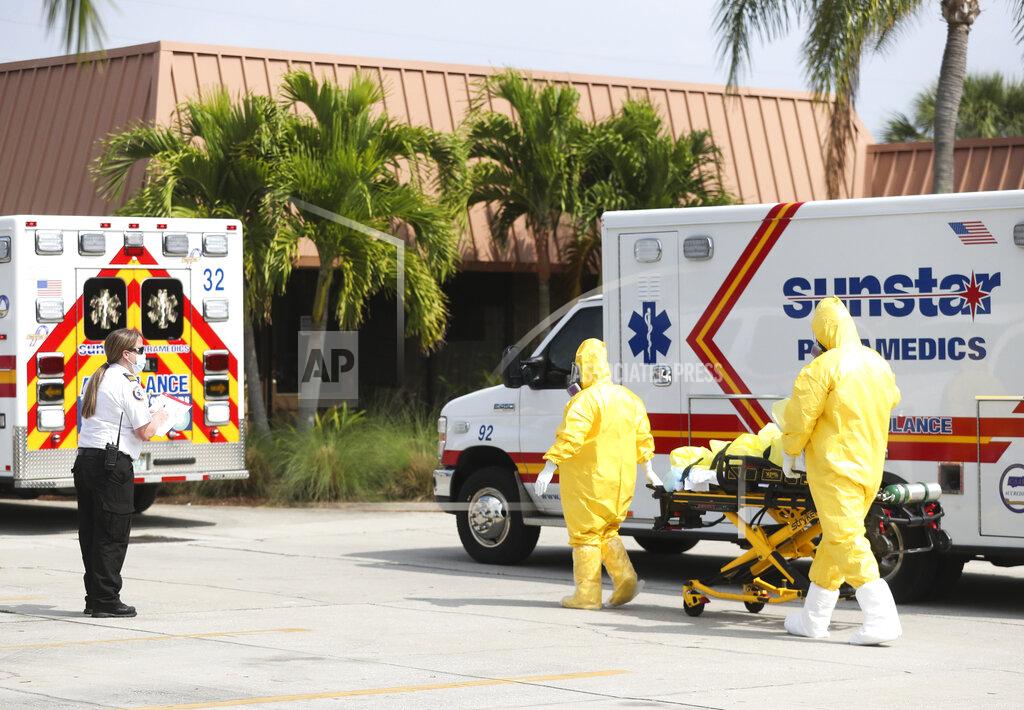 The remaining residents are evacuated from Freedom Square of Seminole, Friday, April 17, 2020. in Seminole, Fla. Three nursing home residents have died of the coronavirus in an outbreak that has afflicted Freedom Square of Seminole, a sprawling retirement community that has seen dozens of residents hospitalized because of the virus, officials said. (Dirk Shadd/Tampa Bay Times via AP)