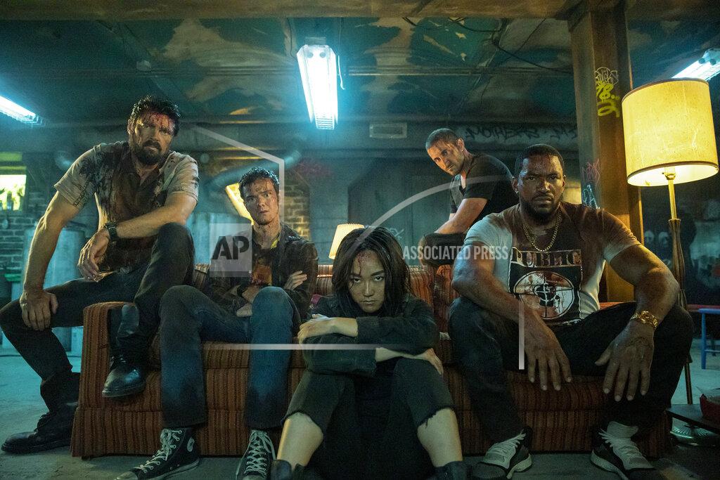 Jasper Savage This image released by Amazon Studios shows, from left, Karl Urban, Jack Quaid, Karen Fukuhara, Tomer Capon and Laz Alonso from the series "The Boys," returning for a second season, Friday, Sept. 4 on Amazon Prime. (Jasper Savage/Amazon Studios via AP)