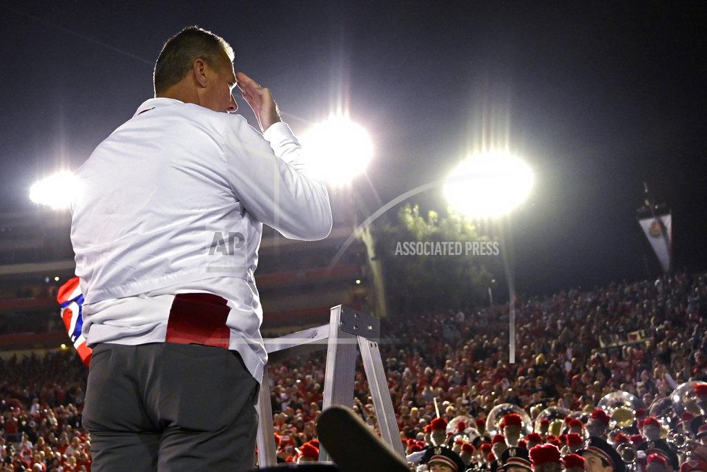 Mark J. Terrill Ohio State coach Urban Meyer gestures to fans after Ohio State defeated Washington 28-23 in the Rose Bowl NCAA college football game Tuesday, Jan. 1, 2019, in Pasadena, Calif. (AP Photo/Mark J. Terrill)