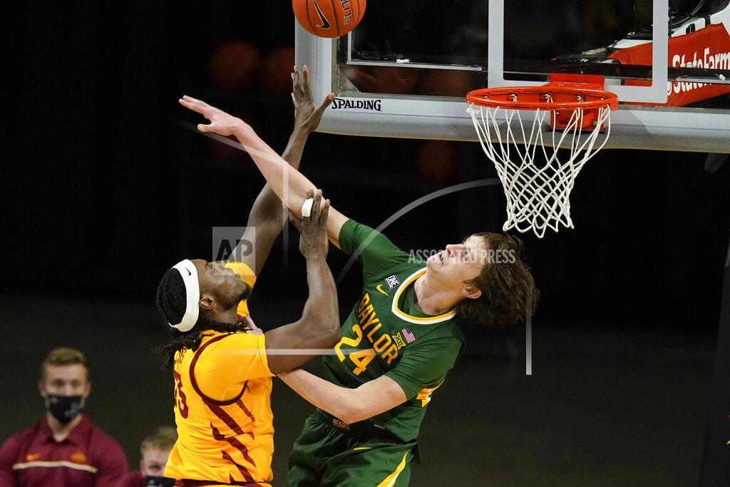 Charlie Neibergall Iowa State forward Solomon Young shoots over Baylor guard Matthew Mayer (24) during the second half of an NCAA college basketball game, Saturday, Jan. 2, 2021, in Ames, Iowa. Baylor won 76-65. (AP Photo/Charlie Neibergall)