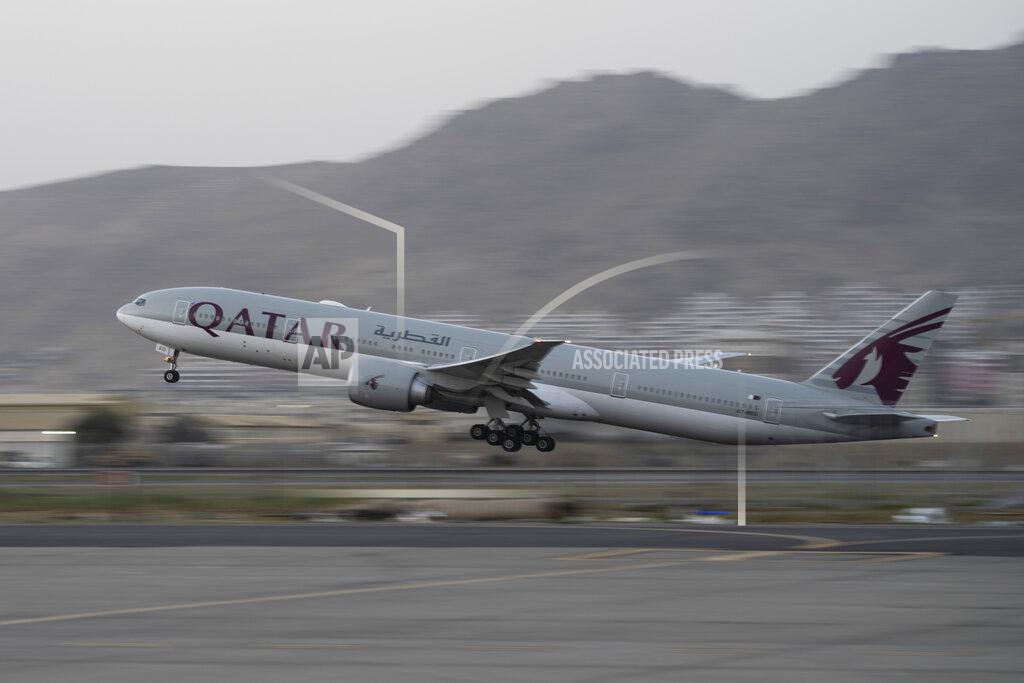 Bernat Armangue A Qatar Airways aircraft takes off with foreigners from the airport in Kabul, Afghanistan, Thursday, Sept. 9, 2021. Some 200 foreigners, including Americans, flew out of Afghanistan on an international commercial flight from Kabul airport on Thursday, the first such large-scale departure since U.S and foreign forces concluded their frantic withdrawal at the end of last month. (AP Photo/Bernat Armangue)