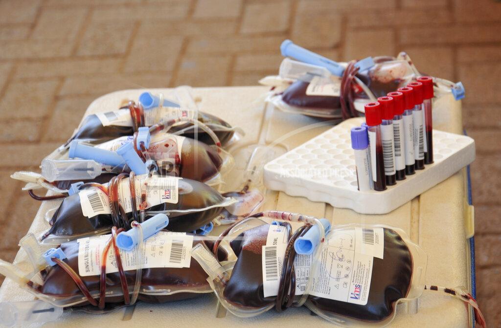 Bags of donated blood are seen at a blood-donation drive organized by the Rotary club and Uganda Blood Transfusion Services in City Square, Kampala, Uganda Saturday, Sept. 19, 2020. Health authorities in Uganda say the supply of blood has sharply declined since the start of the coronavirus pandemic as fewer people donate and schools remain closed. Students, especially those in secondary school, are normally the largest group of blood donors in the East African country. (AP Photo/Ronald Kabuubi)