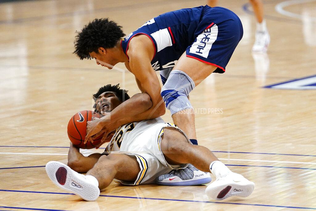 Matt Slocum Villanova's Jermaine Samuels, bottom, and Connecticut's Andre Jackson battle for a loose ball during the second half of an NCAA college basketball game, Saturday, Feb. 20, 2021, in Villanova, Pa. (AP Photo/Matt Slocum)
