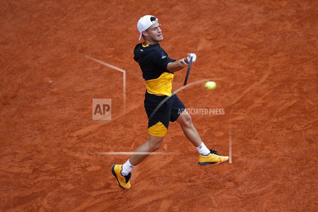 Alessandra Tarantino Argentina's Diego Schwartzman plays a shot against Spain's Rafael Nadal in the semifinal match of the French Open tennis tournament at the Roland Garros stadium in Paris, France, Friday, Oct. 9, 2020. (AP Photo/Alessandra Tarantino)