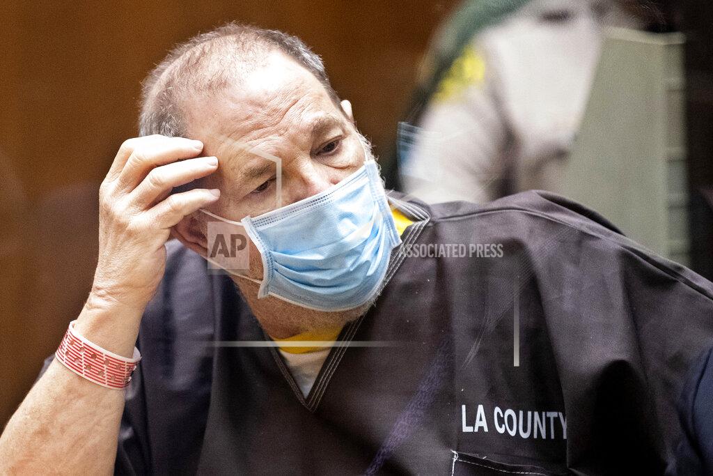 Etienne Laurent Harvey Weinstein, the 69-year-old convicted rapist and disgraced movie mogul, wears a face mask as he listens in court during a pre-trial hearing in Los Angeles, Thursday, 29 July 2021. Weinstein pleaded not guilty Wednesday to four counts of rape and seven other sexual assault counts in California. (Etienne Laurent/Pool Photo via AP)