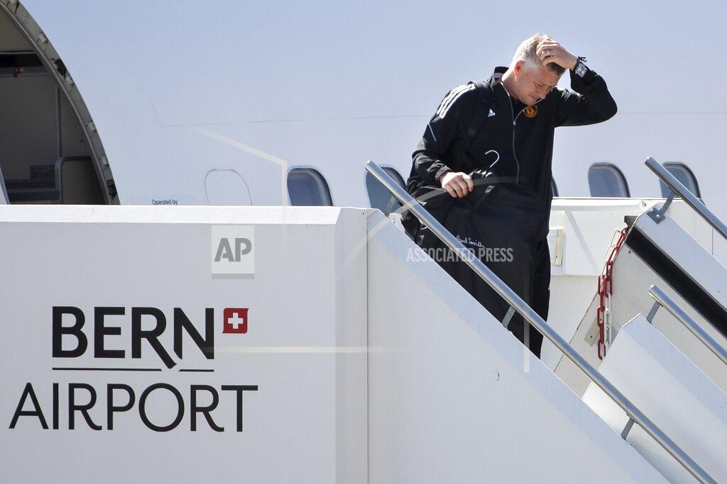 Peter Klaunzer Manchester United's head coach Ole Gunnar Solskjaer disembarks from a plane as he arrives at the Bern Airport, Switzerland Monday, Sept. 13, 2021 one day ahead of the Champions League soccer match between Young Boys Bern and Manchester United. (Peter Klaunzer/Keystone via AP)
