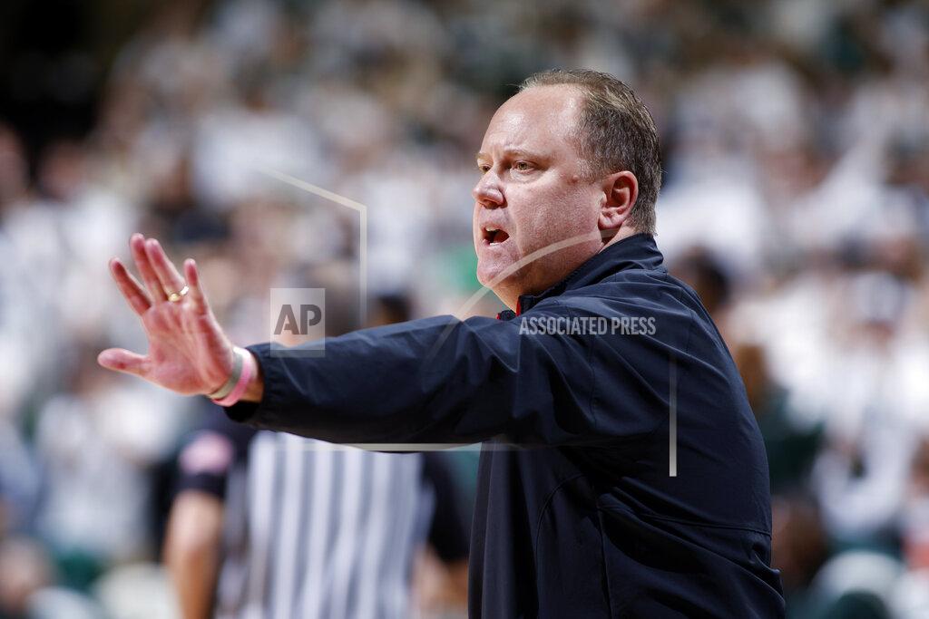 Al Goldis Wisconsin coach Greg Gard gives instructions during the first half of an NCAA college basketball game against Michigan State, Tuesday, Feb. 8, 2022, in East Lansing, Mich. (AP Photo/Al Goldis)