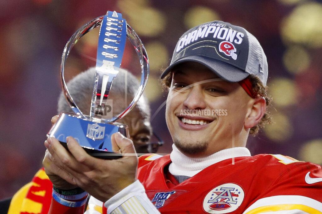 Charlie Neibergall Kansas City Chiefs' Patrick Mahomes holds up the Lamar Hunt Trophy after the NFL AFC Championship football game against the Tennessee Titans Sunday, Jan. 19, 2020, in Kansas City, MO. The Chiefs won 35-24 to advance to Super Bowl 54. (AP Photo/Charlie Neibergall)