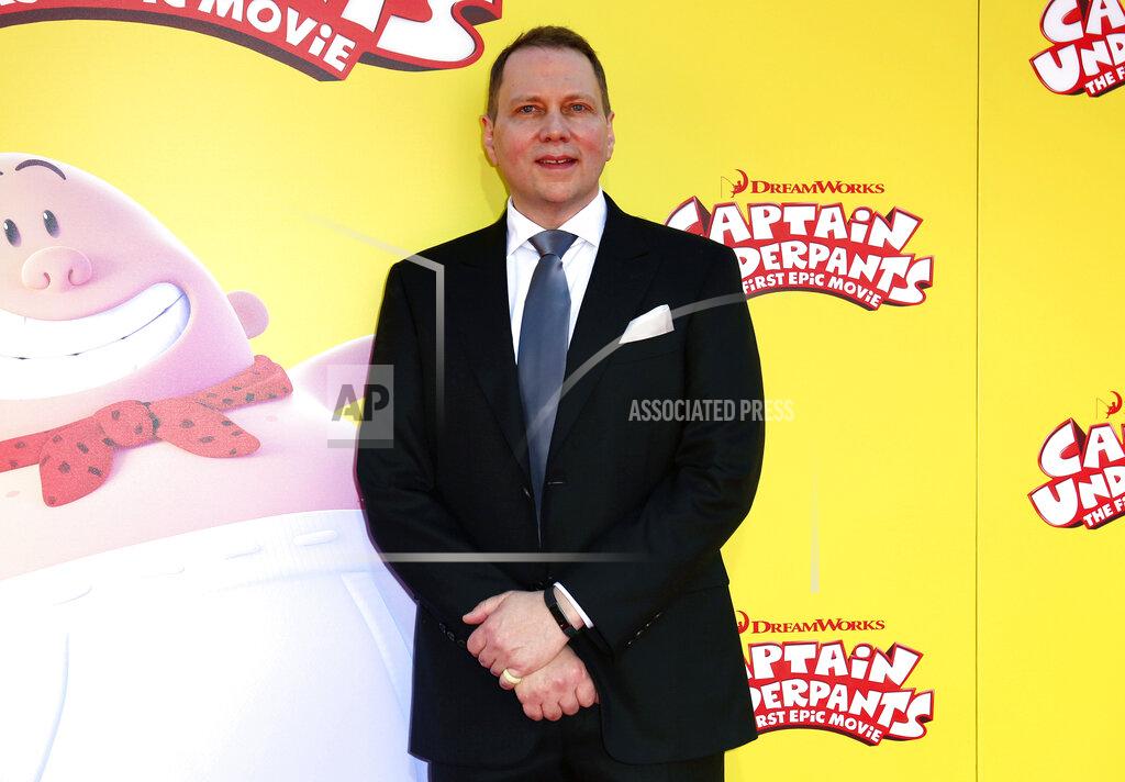 Willy Sanjuan FILE - Dav Pilkey arrives at the premiere of "Captain Underpants: The First Epic Movie" in Los Angeles on May 21, 2017. A graphic novel for children from the wildly popular “Captain Underpants” series, “The Adventures of Ook and Glu," is being pulled from library and book store shelves after its publisher said it “perpetuates passive racism.” (Photo by Willy Sanjuan/Invision/AP, File)