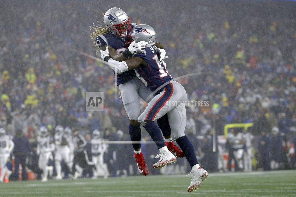 Elise Amendola New England Patriots running back Brandon Bolden, left, celebrates a blocked punt by Matthew Slater, right, in the first half of an NFL football game against the Dallas Cowboys, Sunday, Nov. 24, 2019, in Foxborough, Mass. (AP Photo/Elise Amendola)
