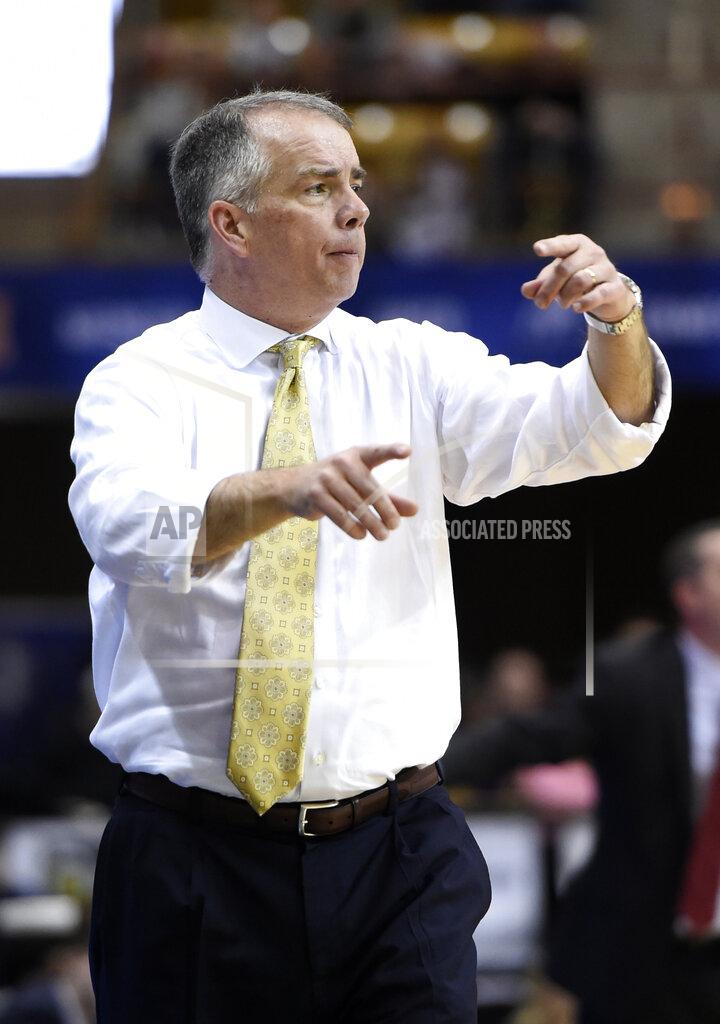Kathy Kmonicek Wofford Terriers head coach Mike Young directs his team against VMI in the second half of an NCAA college basketball game for the Southern Conference basketball tournament championship, Saturday, March 9, 2018, in Asheville, N.C. Wofford won 99-72. (AP Photo/Kathy Kmonicek)