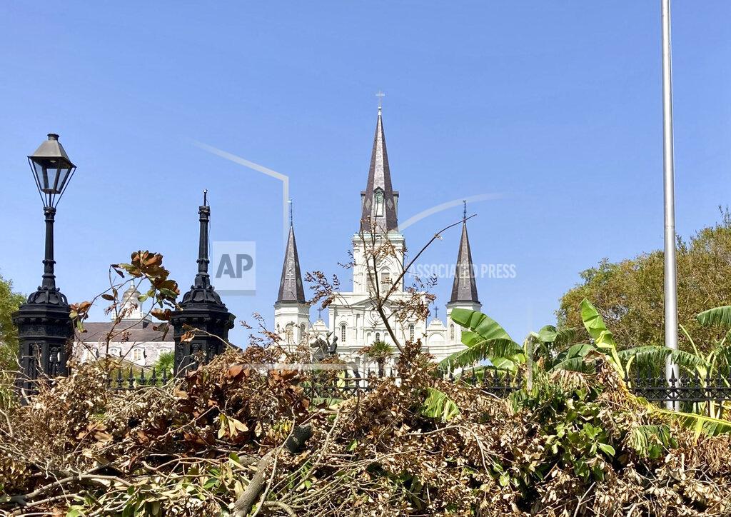 Stacey Plaisance A pile of debris from Hurricane Ida blocks the view of Jackson Square in the heart of the French Quarter in New Orleans on Thursday, Sept. 2, 2021. With nearly all the power back on in New Orleans nearly two weeks after Ida stuck, the city is showing signs of making a comeback from the Category 4 killer. (AP Photo/Stacey Plaisance)
