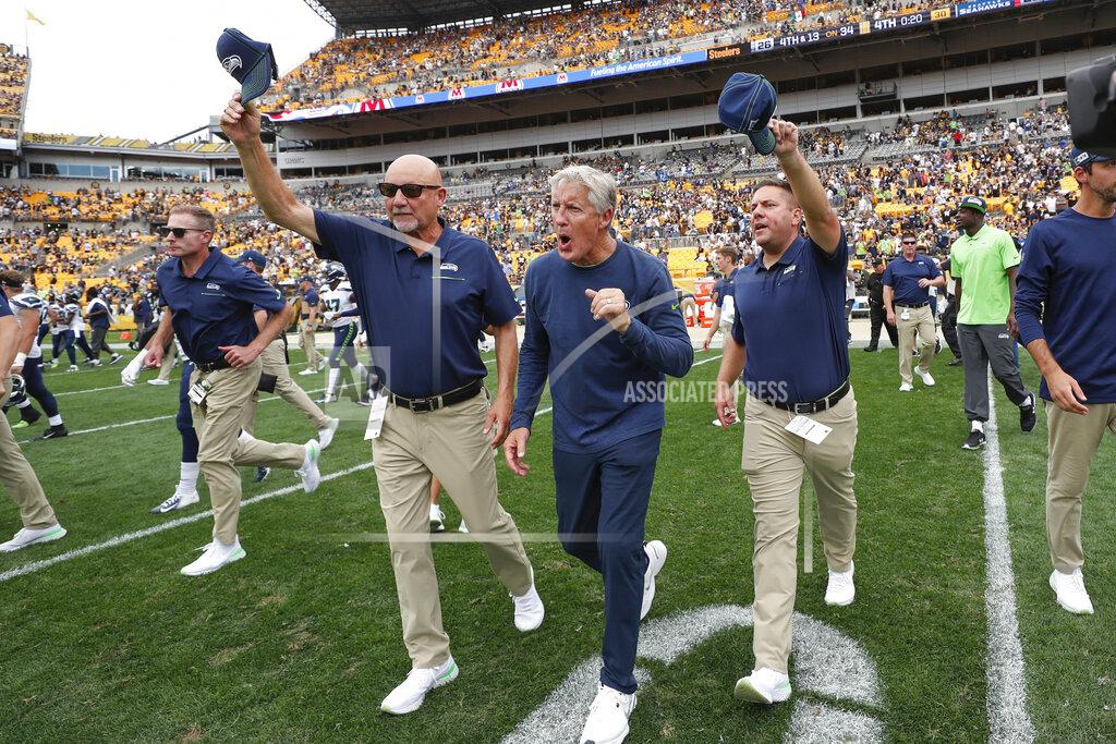 Don Wright Seattle Seahawks head coach Pete Carroll, center, celebrates with other coaches as they take the field after defeating the Pittsburgh Steelers 28-26 in an NFL football game, Sunday, Sept. 15, 2019, in Pittsburgh. (AP Photo/Don Wright)