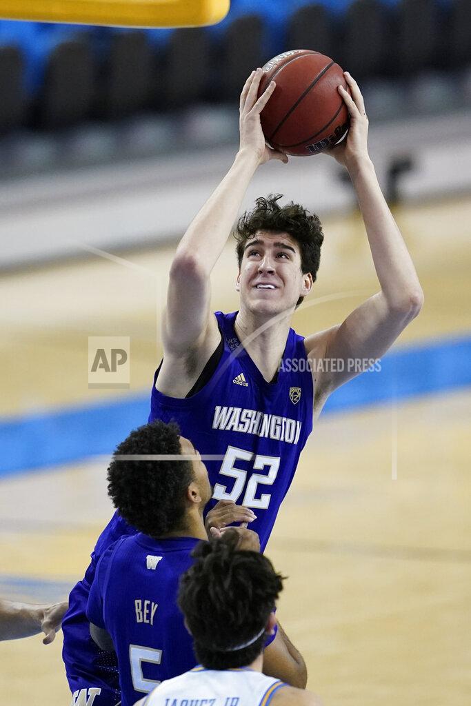 Ashley Landis Washington center Riley Sorn (52) takes a shot during the first half of an NCAA college basketball game against the UCLA Saturday, Jan. 16, 2021, in Los Angeles. (AP Photo/Ashley Landis)