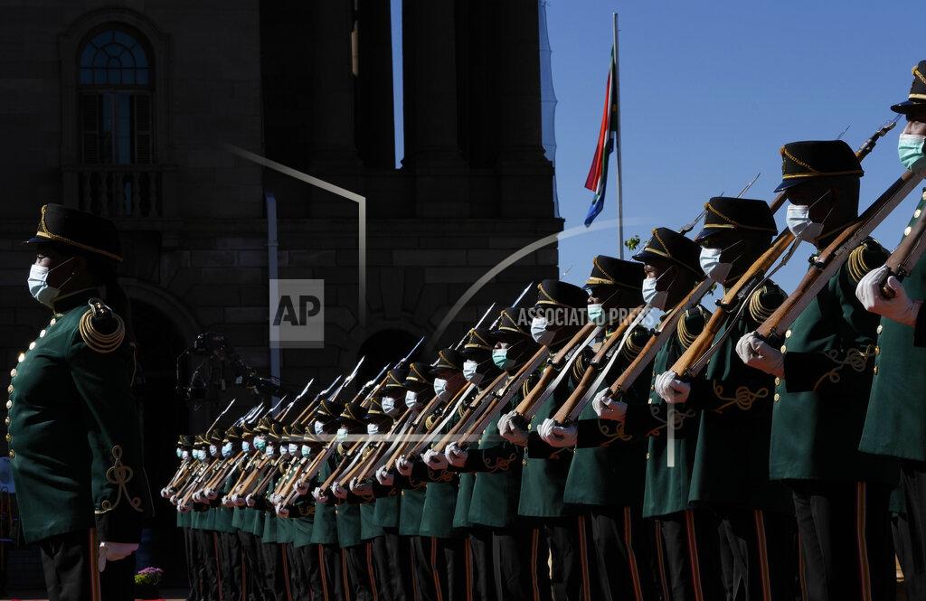 Themba Hadebe Presidential guard of honour officials line up for the official welcoming ceremony for the German Chancellor Olaf Scholz state visit at the Union Building in Pretoria, South Africa, Tuesday, May 24, 2022. (AP Photo/Themba Hadebe)