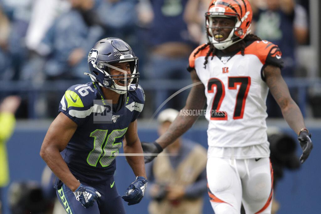 Stephen Brashear Seattle Seahawks wide receiver Tyler Lockett (16) celebrates after scoring a touchdown ahead of Cincinnati Bengals cornerback Dre Kirkpatrick (27) during the second half of an NFL football game Sunday, Sept. 8, 2019, in Seattle. (AP Photo/Stephen Brashear)