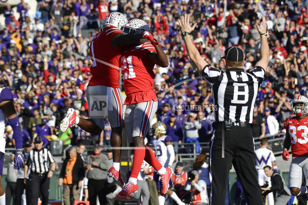 Mark J. Terrill Ohio State wide receiver Parris Campbell, celebrates after scoring with quarterback Dwayne Haskins (7) during the first half of the Rose Bowl NCAA college football game against Washington Tuesday, Jan. 1, 2019, in Pasadena, Calif. (AP Photo/Mark J. Terrill)