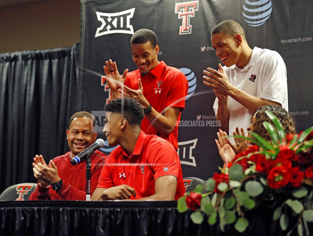 Brad Tollefson Texas Tech's Jarrett Culver, center front, publicly declares to enter the NBA basketball draft while surrounded by his family during a news conference, Thursday, April 18, 2019, in Lubbock, Texas. (Brad Tollefson/Lubbock Avalanche-Journal via AP)