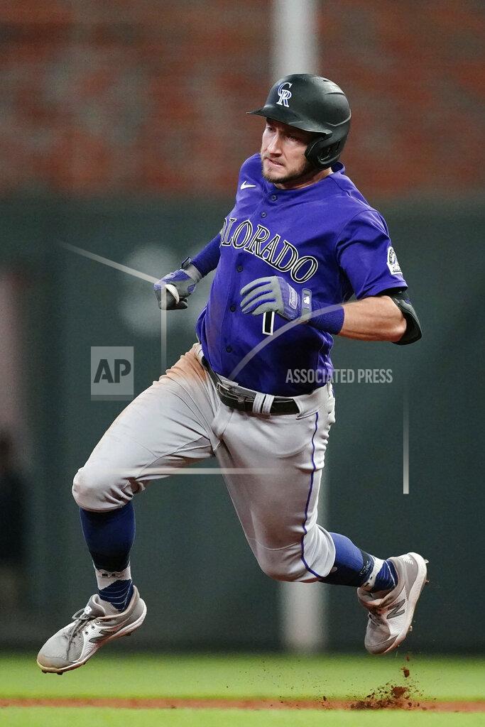 John Bazemore Colorado Rockies second baseman Garrett Hampson (1) rounds the bases on his way to a triple in the sixth inning of a baseball game against the Atlanta Braves Tuesday, Sept. 14, 2021, in Atlanta. (AP Photo/John Bazemore)