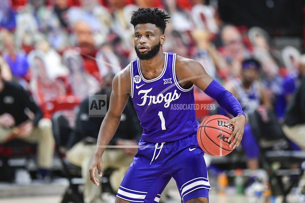 Justin Rex TCU's Mike Miles (1) controls the ball during the first half of an NCAA college basketball game against Texas Tech in Lubbock, Texas, Tuesday, March 2, 2021. (AP Photo/Justin Rex)