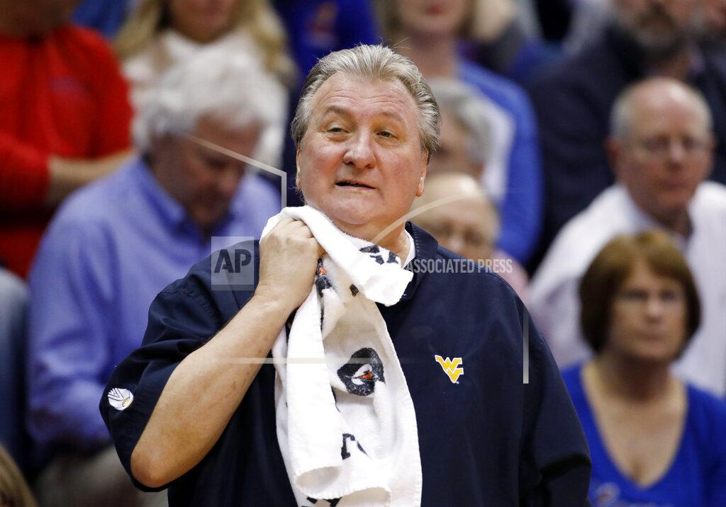 Colin E. Braley West Virginia head coach Bob Huggins towels off during a NCAA college basketball game against Kansas, Saturday, Feb. 16, 2019, in Lawrence, Kan. (AP Photo/Colin E. Braley)
