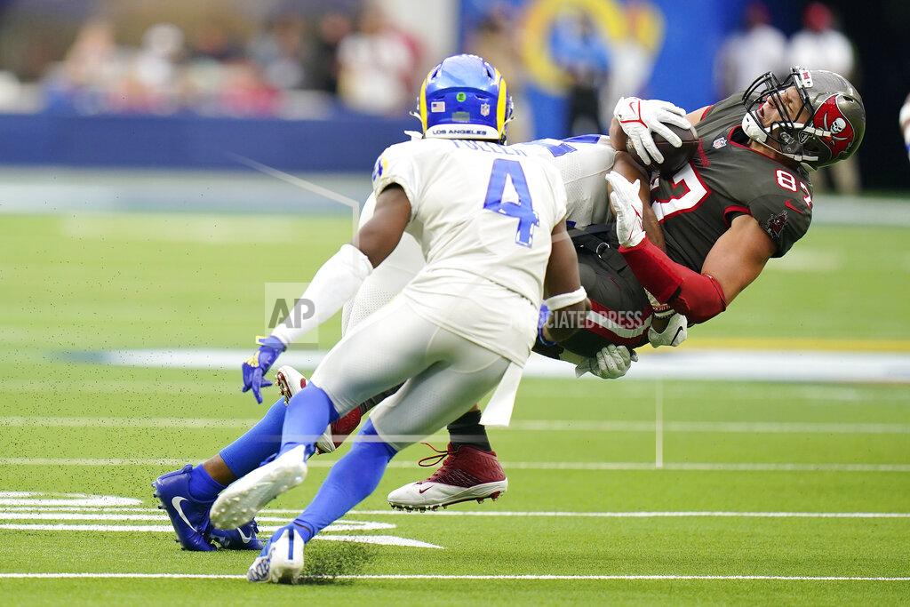 Jae C. Hong Tampa Bay Buccaneers tight end Rob Gronkowski , right, is tackled by Los Angeles Rams linebacker Terrell Lewis during the second half of an NFL football game Sunday, Sept. 26, 2021, in Inglewood, Calif. (AP Photo/Jae C. Hong)