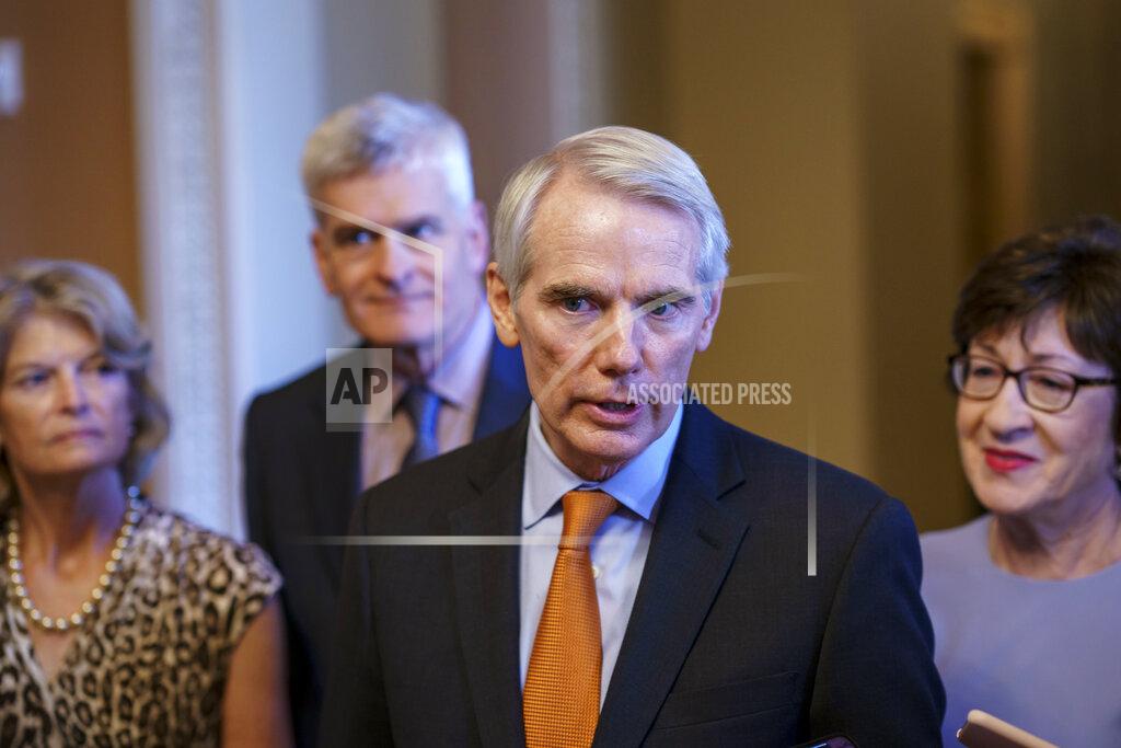 J. Scott Applewhite Sen. Rob Portman, R-Ohio, the lead GOP negotiator in the infrastructure talks, is joined by, from left, Sen. Lisa Murkowski, R-Alaska, Sen. Bill Cassidy, R-La., and Sen. Susan Collins, R-Maine, as he announces an agreement with Democrats on a $1 trillion infrastructure bill, saying they are ready to vote to take up the bill, at the Capitol in Washington, Wednesday, July 28, 2021. (AP Photo/J. Scott Applewhite)