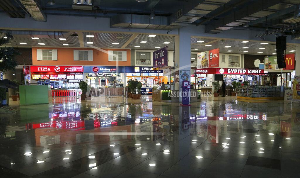 Yuri Strelets An empty shopping mall closed due to a spike in contagion of coronavirus in Samara, Russia, Monday, Oct. 25, 2021. The Samara region was one of the first of Russia's 85 regions to enter a nonworking period Monday, a measure ordered by the Kremlin to stem the spread of infection as the country faced a spike in contagion. (AP Photo/Yuri Strelets)