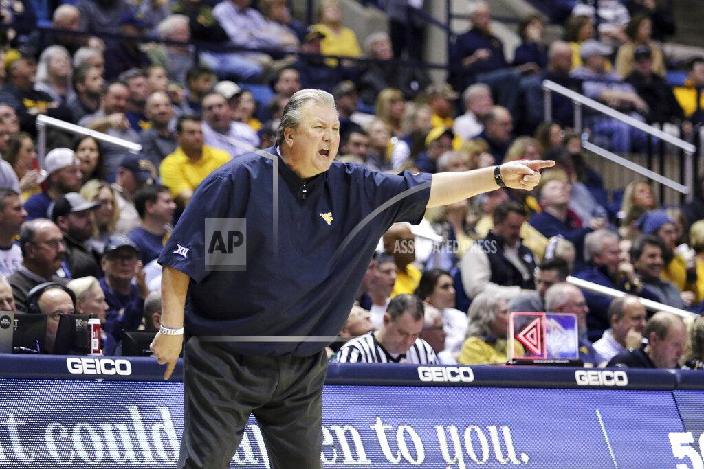 Kathleen Batten West Virginia coach Bob Huggins reacts to a call during the second half of an NCAA college basketball game Wednesday, Feb. 5, 2020, in Morgantown, W.Va. (AP Photo/Kathleen Batten)