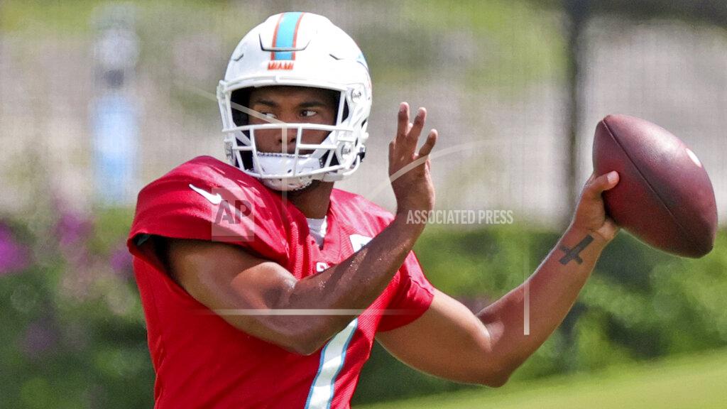 David Santiago Miami Dolphins quarterback Tua Tagovailoa (1) throws during NFL football practice, Wednesday, Sept. 15, 2021, in Miami Gardens, Fla. The Dolphins host the Buffalo Bills on Sunday. (David Santiago/Miami Herald via AP)