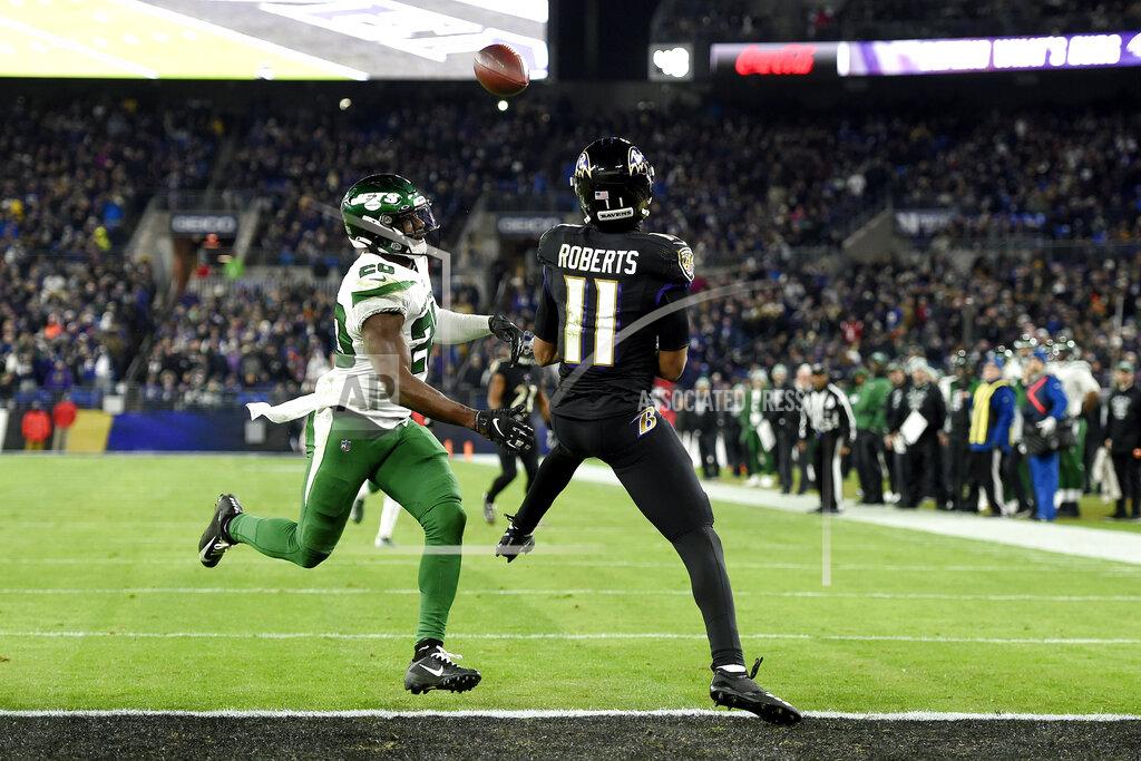 Gail Burton Baltimore Ravens wide receiver Seth Roberts (11) prepares to catch a touchdown pass from quarterback Lamar Jackson, not visible, as New York Jets free safety Marcus Maye (20) defends during the second half of an NFL football game, Thursday, Dec. 12, 2019, in Baltimore. (AP Photo/Gail Burton)